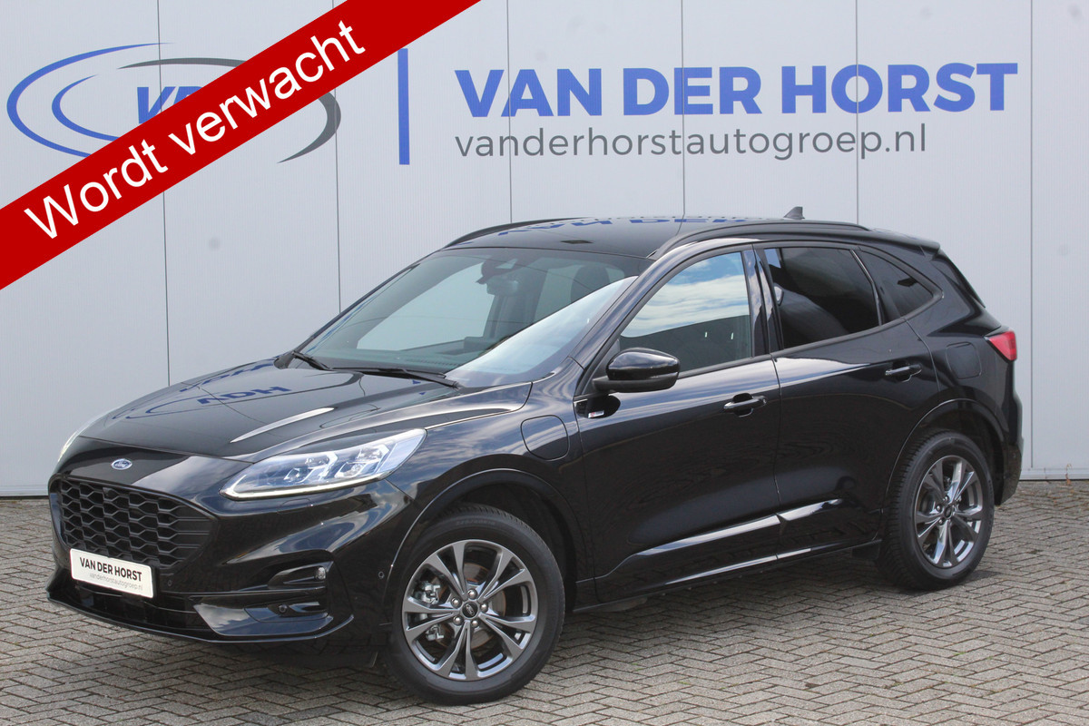 Ford Kuga 2.5-225pk Plug-in Hybrid ST-Line X. Hybride rijden voor een reële prijs ! Adaptive Cruise Control, Stoel- en voorraamverwarming, Climate Control, Metallic lak, Camera v+a, Elektr. achterklep, Side- en lane assist etc.