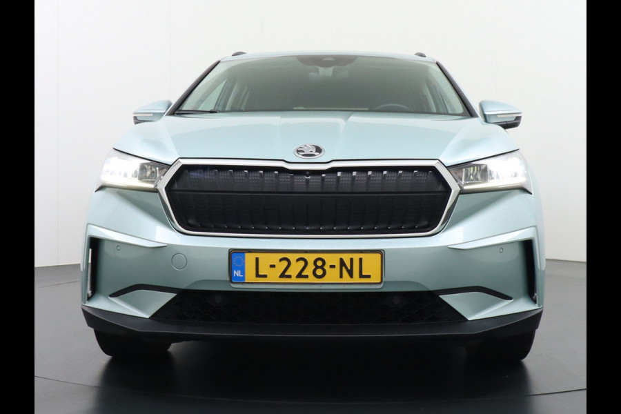Škoda ENYAQ iV 60 180PK Memory Warmetpomp Stoel+Stuurverwarming Apple Carplay/Androd Auto Navi Ecc Adap.Cruise Control 360°Camera Pdc Lmv 20" L File assistent Dab Elek.Achterklep Keyless advanced Bluetooth Rijstrooksensor Connected services 1.000KG trekgewicht 1e Eigenaar Origineel Nederlandse Auto Nieuwprijs €47.965!