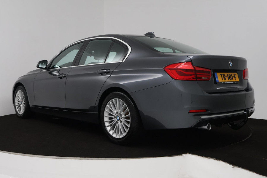 BMW 3 Serie 318i Luxury Edition (NAVIGATIE, STOELVERWARMING, TREKHAAK AFNEEMBAAR, CAMERA, SPORTSTOELEN)