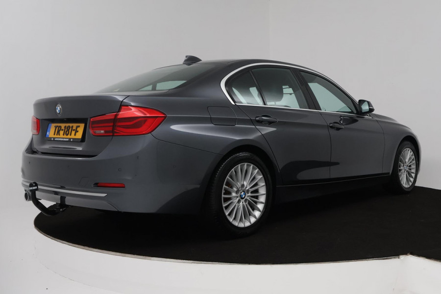 BMW 3 Serie 318i Luxury Edition (NAVIGATIE, STOELVERWARMING, TREKHAAK AFNEEMBAAR, CAMERA, SPORTSTOELEN)
