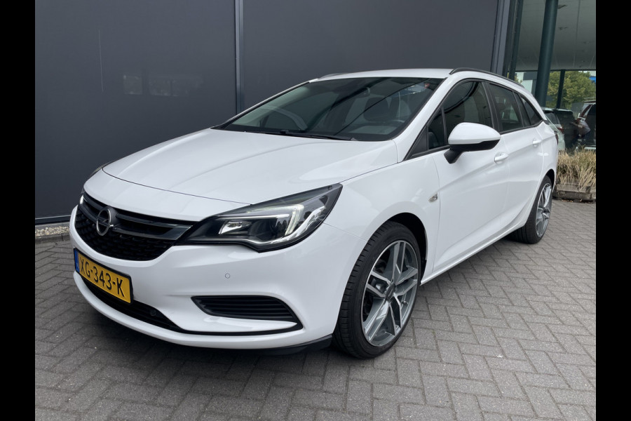 Opel Astra Sports Tourer 1.0 Turbo Online Edition Airco - Cruise control - Parkeersensoren achter - Licht metalen velgen 18 inch - Navigatie - Lederen stuurwiel