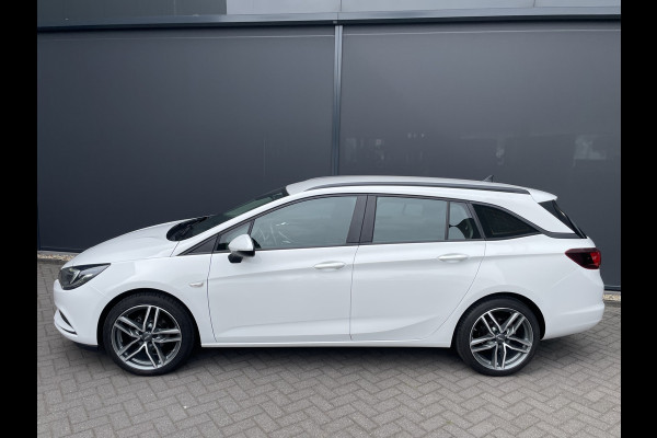 Opel Astra Sports Tourer 1.0 Turbo Online Edition Airco - Cruise control - Parkeersensoren achter - Licht metalen velgen 18 inch - Navigatie - Lederen stuurwiel