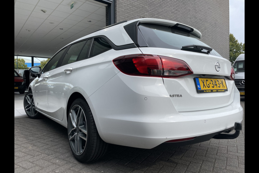 Opel Astra Sports Tourer 1.0 Turbo Online Edition Airco - Cruise control - Parkeersensoren achter - Licht metalen velgen 18 inch - Navigatie - Lederen stuurwiel