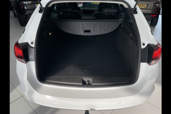 Opel Astra Sports Tourer 1.0 Turbo Online Edition Airco - Cruise control - Parkeersensoren achter - Licht metalen velgen 18 inch - Navigatie - Lederen stuurwiel