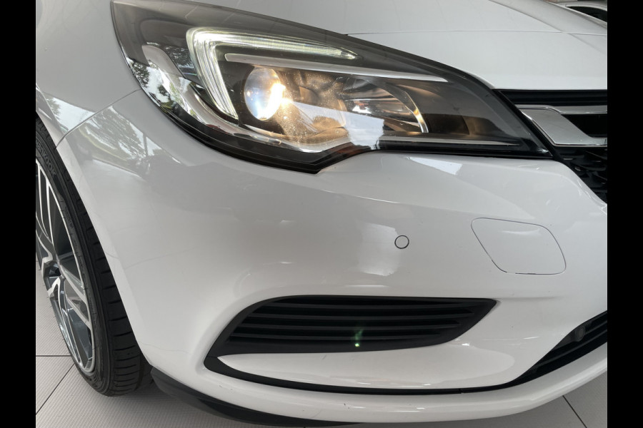 Opel Astra Sports Tourer 1.0 Turbo Online Edition Airco - Cruise control - Parkeersensoren achter - Licht metalen velgen 18 inch - Navigatie - Lederen stuurwiel