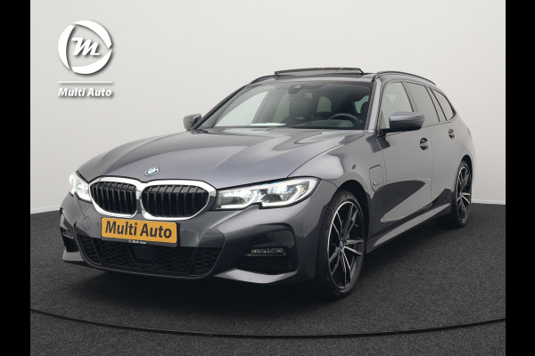 BMW 3 Serie Touring 330e M Sport Plug In Hybrid 293pk Dealer O.H PHEV | Trekhaak Af Fabriek | Panodak | Head Up | Adaptive Cruise | Apple Carplay | Sfeerverlichting | Alcantara Sportstoelen Verwarmd | Navigatie | Virtual | DAB |