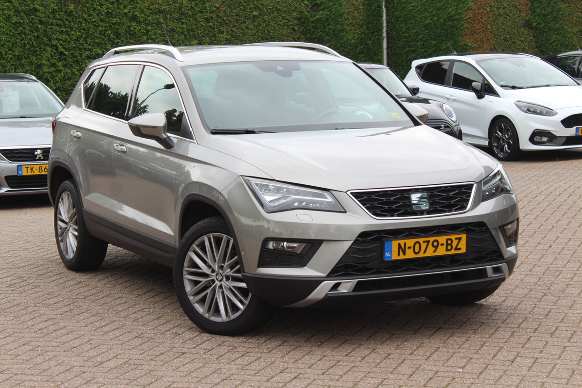 Seat Ateca 1.4 EcoTSI Xcellence / Trekhaak / Camera / Leder / Standkachel / 18'' / Navigatie / Dodehoek / Stoelverwarming / ACC Seat Ateca 1.4 EcoTSI Xcellence / Trekhaak / Camera / Leder / Standkachel / 18'' / Navigatie / Dodehoek / Stoelverwarming / ACC