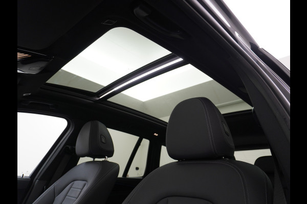 BMW iX3 Executive 80kWhPanoramadak Leer+Verwarmd+Memory Adaptieve LEDApple Carplay Android Auto Trekhaak Pdc Camera DAB Live Cockpit Pro Lmv Elek.Achterklep Regen-Lichtsensor Achteruitrij-assistent 1e Eigenaar Origineel Nederlands Nieuwprijs €68.172,-
