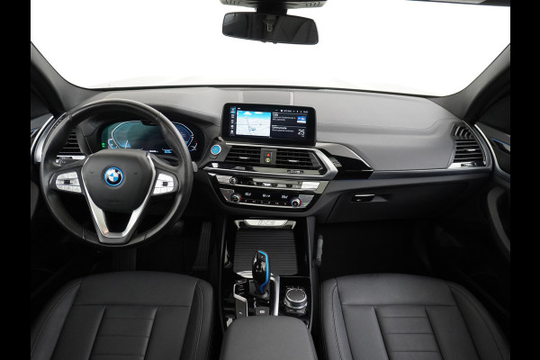 BMW iX3 Executive 80kWhPanoramadak Leer+Verwarmd+Memory Adaptieve LEDApple Carplay Android Auto Trekhaak Pdc Camera DAB Live Cockpit Pro Lmv Elek.Achterklep Regen-Lichtsensor Achteruitrij-assistent 1e Eigenaar Origineel Nederlands Nieuwprijs €68.172,-