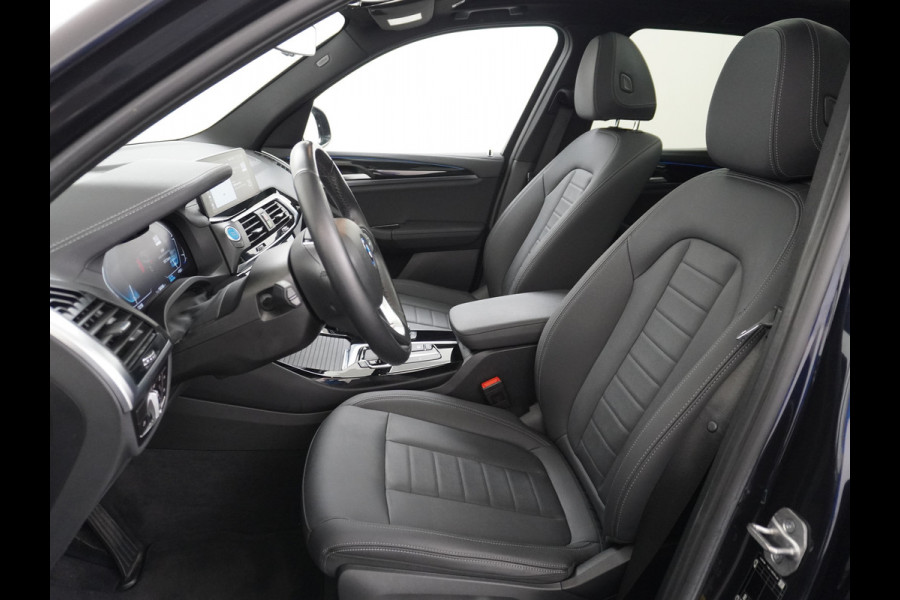 BMW iX3 Executive 80kWhPanoramadak Leer+Verwarmd+Memory Adaptieve LEDApple Carplay Android Auto Trekhaak Pdc Camera DAB Live Cockpit Pro Lmv Elek.Achterklep Regen-Lichtsensor Achteruitrij-assistent 1e Eigenaar Origineel Nederlands Nieuwprijs €68.172,-