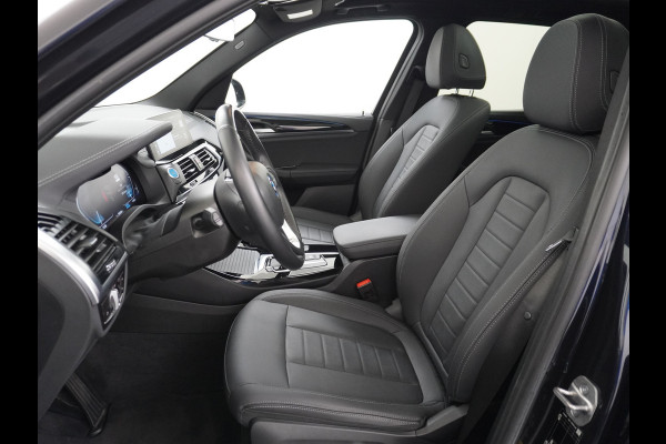 BMW iX3 Executive 80kWhPanoramadak Leer+Verwarmd+Memory Adaptieve LEDApple Carplay Android Auto Trekhaak Pdc Camera DAB Live Cockpit Pro Lmv Elek.Achterklep Regen-Lichtsensor Achteruitrij-assistent 1e Eigenaar Origineel Nederlands Nieuwprijs €68.172,-