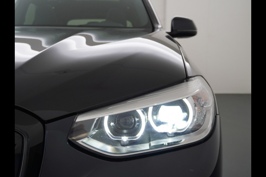 BMW iX3 Executive 80kWhPanoramadak Leer+Verwarmd+Memory Adaptieve LEDApple Carplay Android Auto Trekhaak Pdc Camera DAB Live Cockpit Pro Lmv Elek.Achterklep Regen-Lichtsensor Achteruitrij-assistent 1e Eigenaar Origineel Nederlands Nieuwprijs €68.172,-