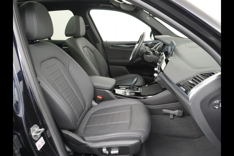 BMW iX3 Executive 80kWhPanoramadak Leer+Verwarmd+Memory Adaptieve LEDApple Carplay Android Auto Trekhaak Pdc Camera DAB Live Cockpit Pro Lmv Elek.Achterklep Regen-Lichtsensor Achteruitrij-assistent 1e Eigenaar Origineel Nederlands Nieuwprijs €68.172,-