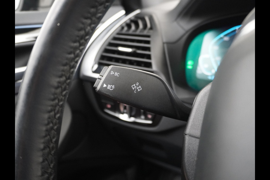 BMW iX3 Executive 80kWhPanoramadak Leer+Verwarmd+Memory Adaptieve LEDApple Carplay Android Auto Trekhaak Pdc Camera DAB Live Cockpit Pro Lmv Elek.Achterklep Regen-Lichtsensor Achteruitrij-assistent 1e Eigenaar Origineel Nederlands Nieuwprijs €68.172,-