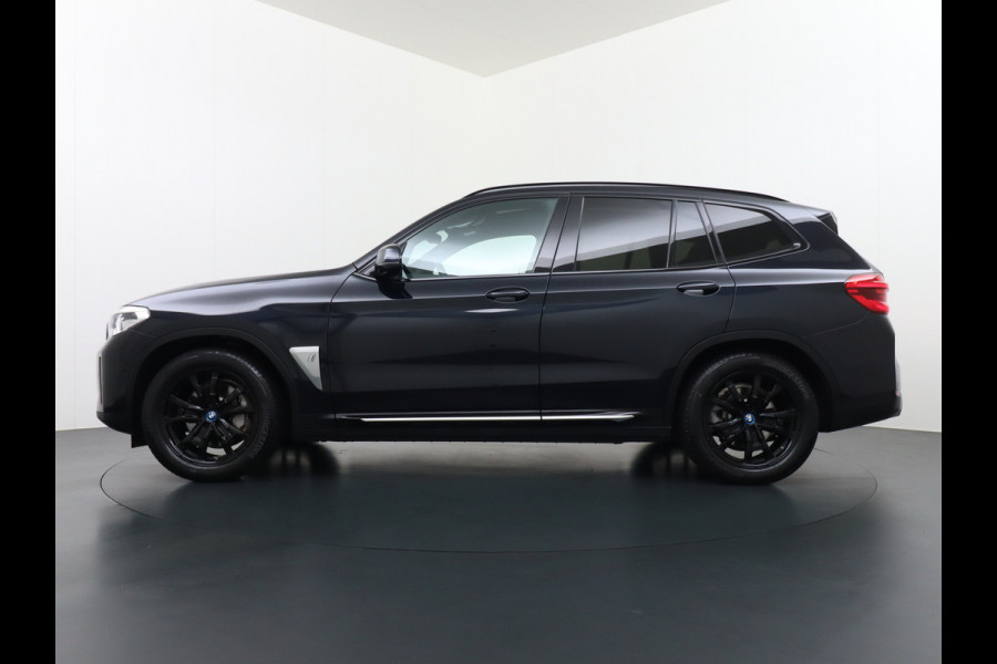 BMW iX3 Executive 80kWhPanoramadak Leer+Verwarmd+Memory Adaptieve LEDApple Carplay Android Auto Trekhaak Pdc Camera DAB Live Cockpit Pro Lmv Elek.Achterklep Regen-Lichtsensor Achteruitrij-assistent 1e Eigenaar Origineel Nederlands Nieuwprijs €68.172,-