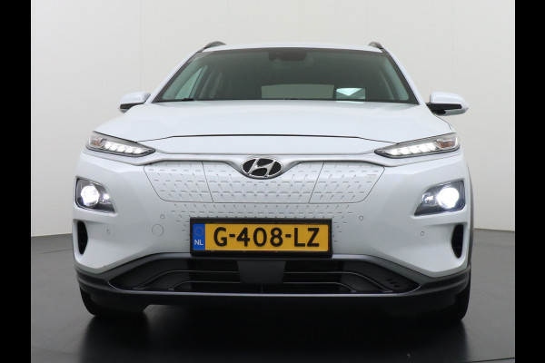 Hyundai Kona EV 64kWh 204pk Premium Leer Head-Up Display Apple Carplay Android Navi Camera Elektr.Stoelen+Verwarmd Adaptive Cruise/Stop&Go Ze Pdc Subwoofer Bluetooth Dodehoek detector Privacy Glas Rijstrooksensor