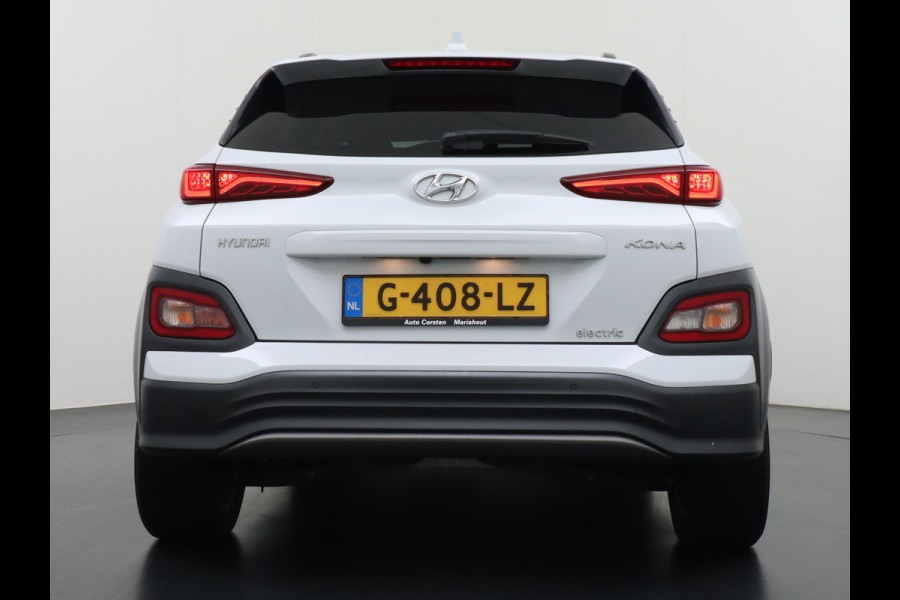 Hyundai Kona EV 64kWh 204pk Premium Leer Head-Up Display Apple Carplay Android Navi Camera Elektr.Stoelen+Verwarmd Adaptive Cruise/Stop&Go Ze Pdc Subwoofer Bluetooth Dodehoek detector Privacy Glas Rijstrooksensor