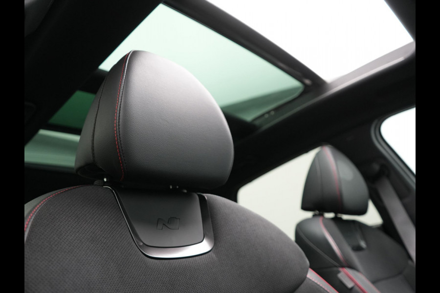 Hyundai Tucson 1.6 T-GDI N Line Sky 4WD Plug In Hybrid 265pk PHEV | Panodak | Alcantara Sportstoelen Memory & Ventilatie | Adaptive Cruise | Camera | Keyless | Krell Premium Sound | Apple Carplay | 19"L.M | Stuurverwarming |