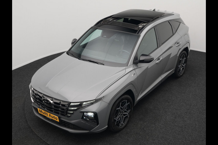 Hyundai Tucson 1.6 T-GDI N Line Sky 4WD Plug In Hybrid 265pk PHEV | Panodak | Alcantara Sportstoelen Memory & Ventilatie | Adaptive Cruise | Camera | Keyless | Krell Premium Sound | Apple Carplay | 19"L.M | Stuurverwarming |