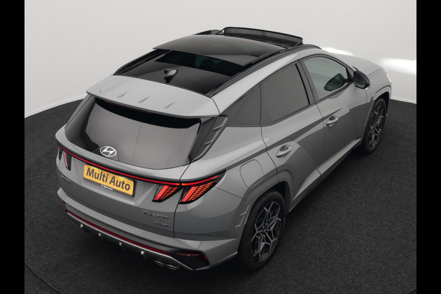Hyundai Tucson 1.6 T-GDI N Line Sky 4WD Plug In Hybrid 265pk PHEV | Panodak | Alcantara Sportstoelen Memory & Ventilatie | Adaptive Cruise | Camera | Keyless | Krell Premium Sound | Apple Carplay | 19"L.M | Stuurverwarming |