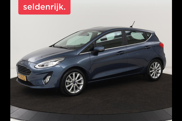 Ford Fiesta 1.0 EcoBoost Titanium | Stoel & stuurverwarming | Trekhaak | Carplay | Climate control | Cruise control | Verwarmde voorruit | Parkeerhulp