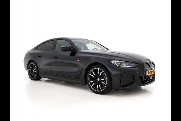 BMW i4 M50 High Executive 84 kWh M-Sportpack [ 3-Fase ] (INCL.BTW) Aut. *HEAD-UP | LUXURY-LEATHER | LASER-LIGHT | ADAPTIVE-CRUISE | HARMAN/KARDON | TOP-VIEW | SPORTSEATS | BLIND-SPOT | WIDE-SCREEN | KEYLESS | DAB+ | NAVI-FULLMAP | 19''ALU | TOWBAR