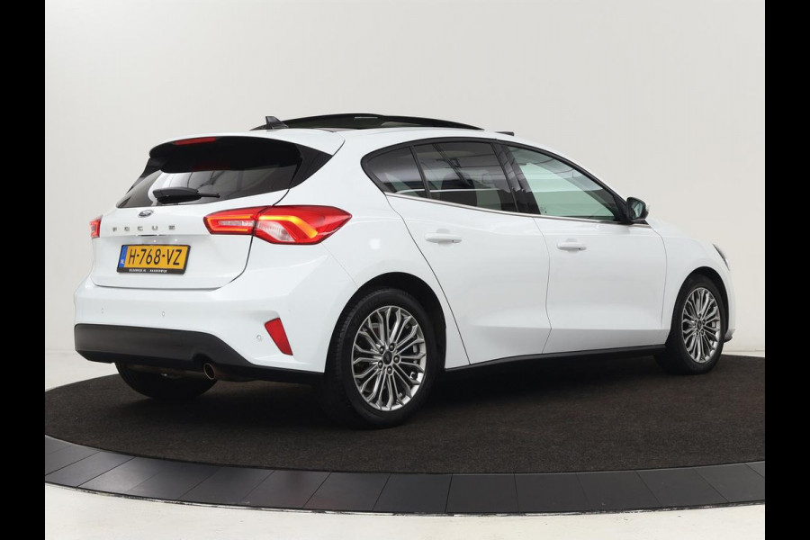 Ford Focus 1.0 EcoBoost Titanium | Panoramadak | Head-Up | Stoel & stuurverwarming | Adaptive cruise | B&O Sound | Full LED | Carplay | Keyless | Climate control | Navigatie | Parkeerhulp