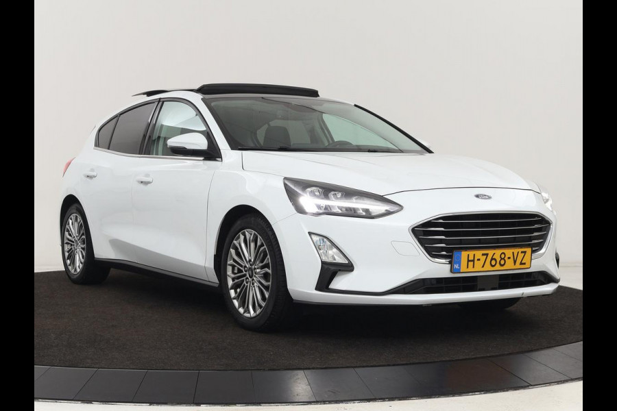 Ford Focus 1.0 EcoBoost Titanium | Panoramadak | Head-Up | Stoel & stuurverwarming | Adaptive cruise | B&O Sound | Full LED | Carplay | Keyless | Climate control | Navigatie | Parkeerhulp