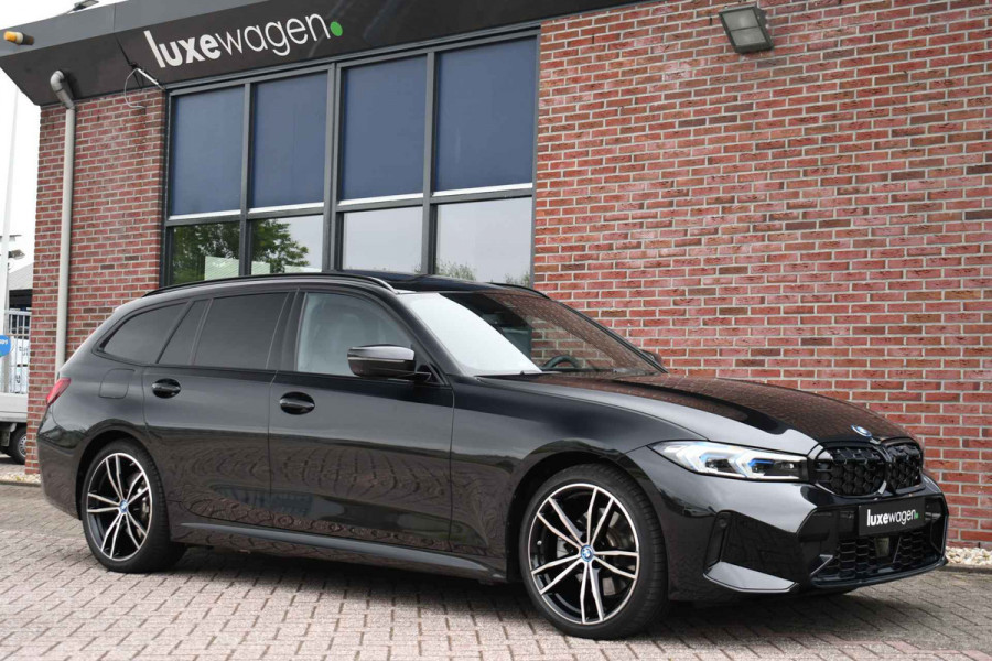 BMW 3 Serie Touring 320e M-Sport Pano El-zetels 360-cam HUD 19inch