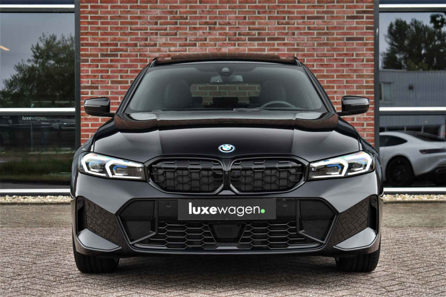 BMW 3 Serie Touring 320e M-Sport Pano El-zetels 360-cam HUD 19inch