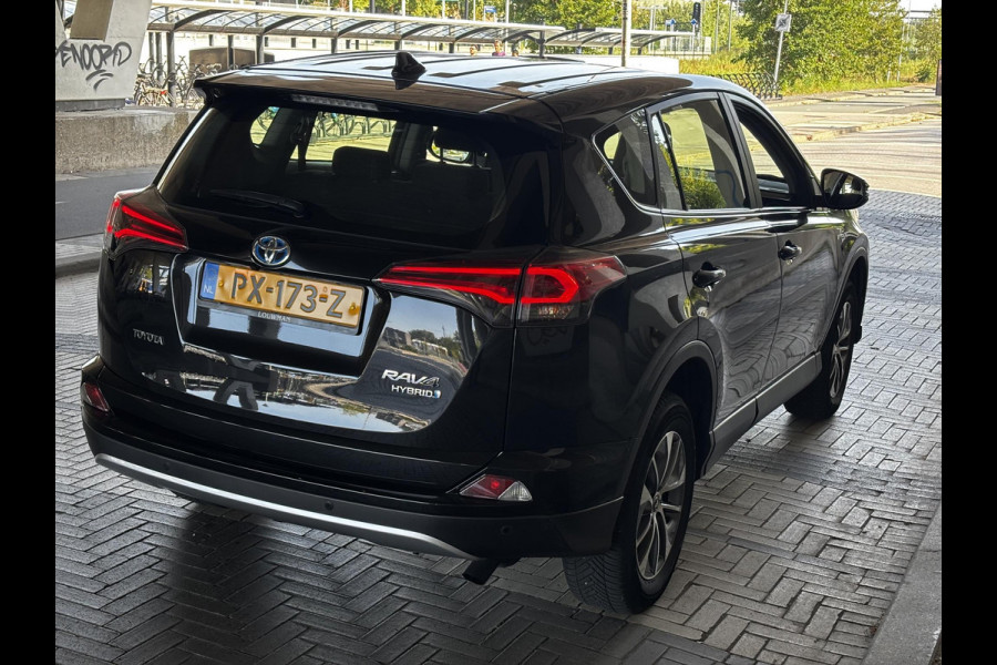 Toyota RAV4 2.5 HYBRID DYNAMIC BLACK GARANTIE 10-2027 NAVI.ADAPTIVE CRUISE.PDC VOOR+ACHTER 100% ONDERHOUDEN