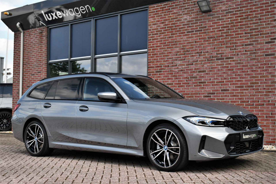 BMW 3 Serie Touring 330e xDrive M-Sport Pano ACC 19inch HUD El-zetels Camera