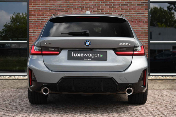 BMW 3 Serie Touring 330e xDrive M-Sport Pano ACC 19inch HUD El-zetels Camera