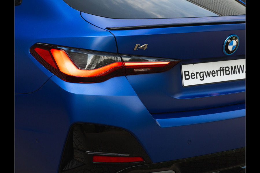 BMW i4 M50 - Dak - Memoryzetel - Trekhaak - Leder Dash - Driving + Parking Ass Prof