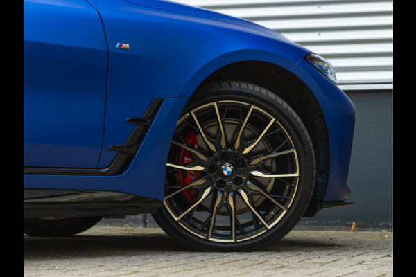 BMW i4 M50 - Dak - Memoryzetel - Trekhaak - Leder Dash - Driving + Parking Ass Prof
