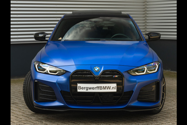 BMW i4 M50 - Dak - Memoryzetel - Trekhaak - Leder Dash - Driving + Parking Ass Prof