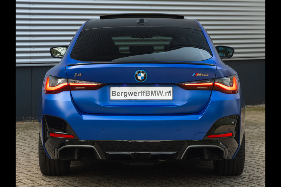 BMW i4 M50 - Dak - Memoryzetel - Trekhaak - Leder Dash - Driving + Parking Ass Prof