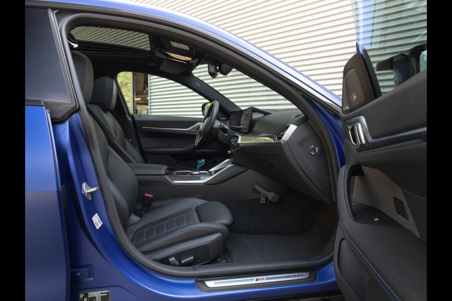 BMW i4 M50 - Dak - Memoryzetel - Trekhaak - Leder Dash - Driving + Parking Ass Prof