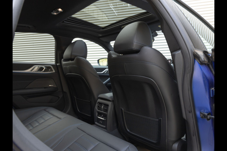 BMW i4 M50 - Dak - Memoryzetel - Trekhaak - Leder Dash - Driving + Parking Ass Prof