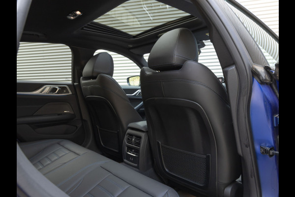BMW i4 M50 - Dak - Memoryzetel - Trekhaak - Leder Dash - Driving + Parking Ass Prof