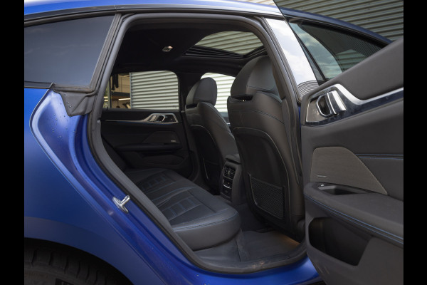 BMW i4 M50 - Dak - Memoryzetel - Trekhaak - Leder Dash - Driving + Parking Ass Prof