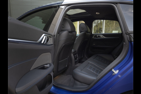 BMW i4 M50 - Dak - Memoryzetel - Trekhaak - Leder Dash - Driving + Parking Ass Prof