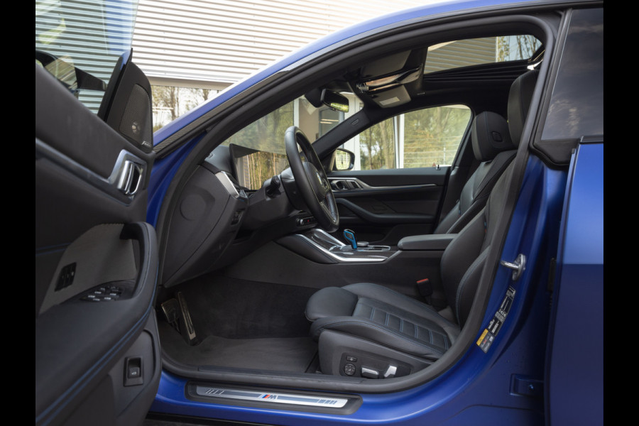 BMW i4 M50 - Dak - Memoryzetel - Trekhaak - Leder Dash - Driving + Parking Ass Prof