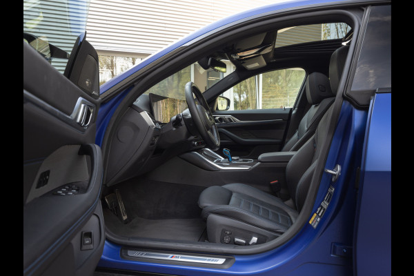 BMW i4 M50 - Dak - Memoryzetel - Trekhaak - Leder Dash - Driving + Parking Ass Prof