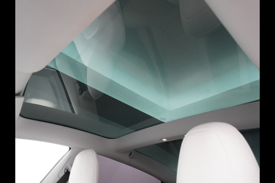 Tesla Model 3 Long Range AWD 75kWh 463PK Trekhaak 19" Ivory FSD-3 Computer Premium Audio AutoPilot Panoramadak Camera's Leer Adaptive-Cruise-C 4WD Stoel en achterbank verwarming Elektr.Stoelen+Memory+Easy-Entry WiFi Garantie op Accu tot 23-12-2027/192.000km