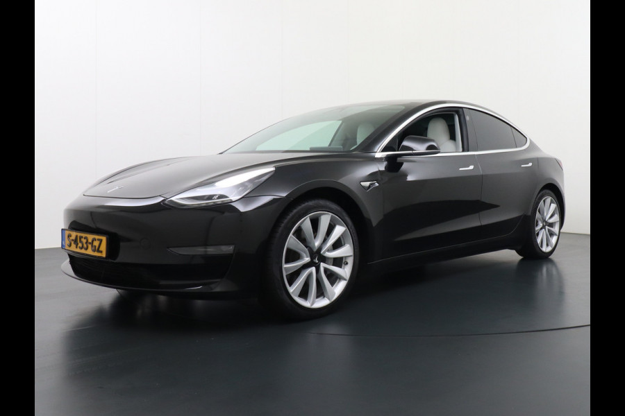 Tesla Model 3 Long Range AWD 75kWh 463PK Trekhaak 19" Ivory FSD-3 Computer Premium Audio AutoPilot Panoramadak Camera's Leer Adaptive-Cruise-C 4WD Stoel en achterbank verwarming Elektr.Stoelen+Memory+Easy-Entry WiFi Garantie op Accu tot 23-12-2027/192.000km