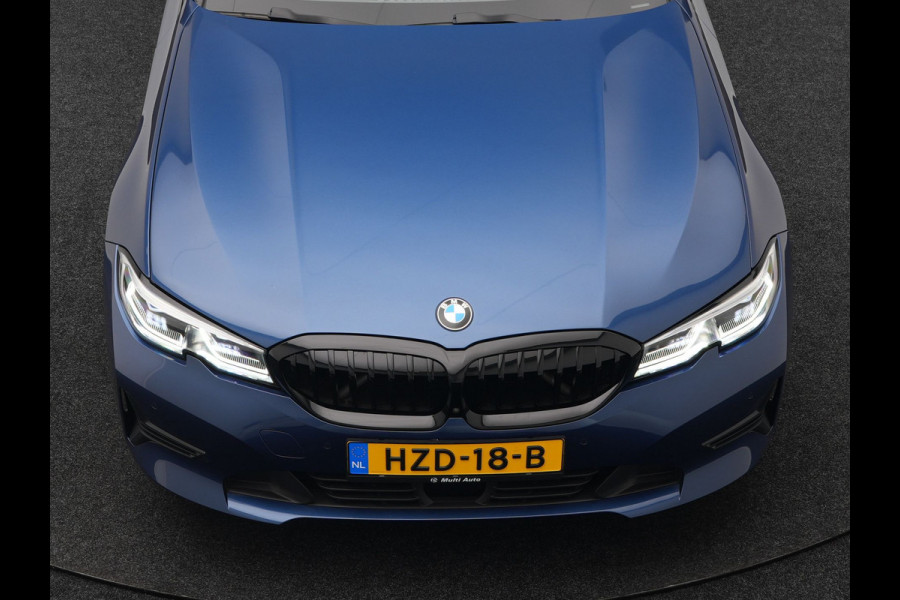 BMW 3 Serie Touring 330e Plug In Hybrid 293pk Dealer O.H PHEV | Trekhaak Af Fabriek | Panodak | Laser LED | Head Up | 360 Camera | Adaptive Cruise | Keyless | Carplay | Lederen Sportstoelen Memory & Verwarmd | Sfeerverlichting | Navigatie |