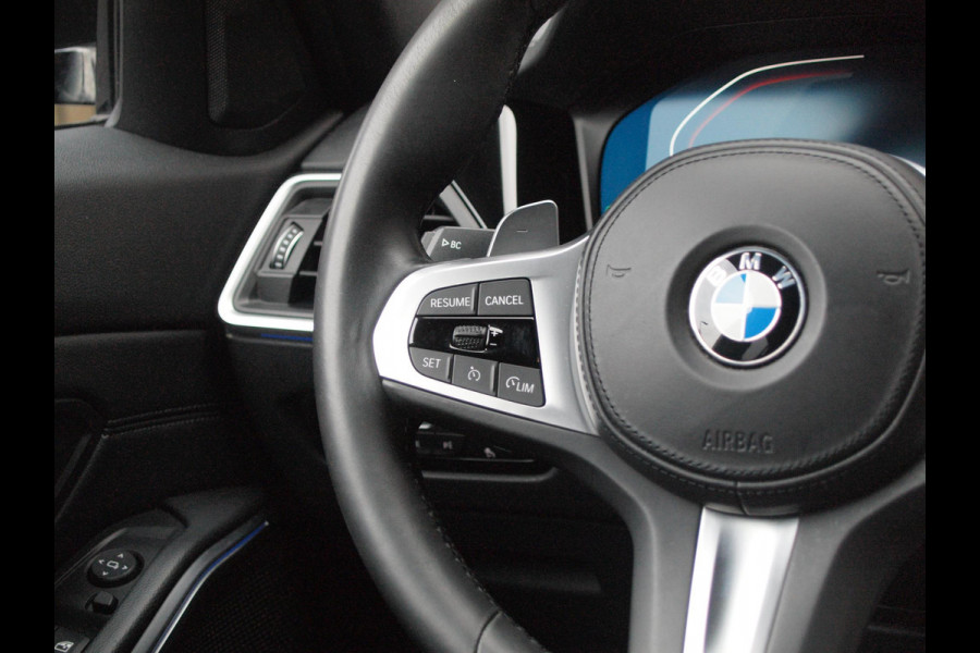 BMW 3 Serie Touring 320i High Executive Edition | M-Pakket | Camera | Sfeerverlichting | Black optiek | Apple Carplay |