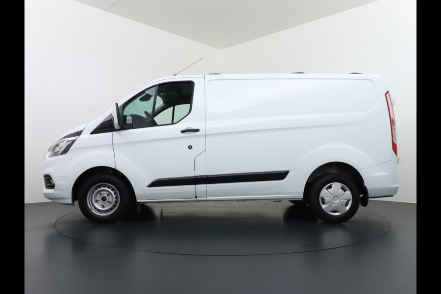 Ford Transit Custom 280 2.0TDCI 105PK L1H1 Airco Cruise Control Trekhaak PDC Bluetooth DAB 3-Persoons Trend Schuifdeur Betonplex Wandbetimmering Kastenbouw Euro 6 1e Eigenaar 2.500KG Trekgewicht