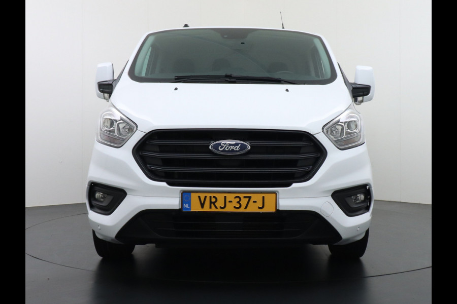 Ford Transit Custom 280 2.0TDCI 105PK L1H1 Airco Cruise Control Trekhaak PDC Bluetooth DAB 3-Persoons Trend Schuifdeur Betonplex Wandbetimmering Kastenbouw Euro 6 1e Eigenaar 2.500KG Trekgewicht
